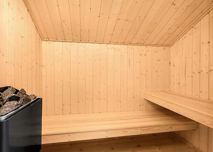 Dom wakacyjny Lovely In With Sauna *